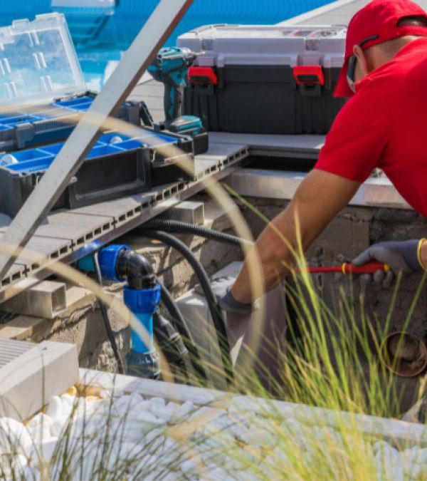 Man working on pool filter.