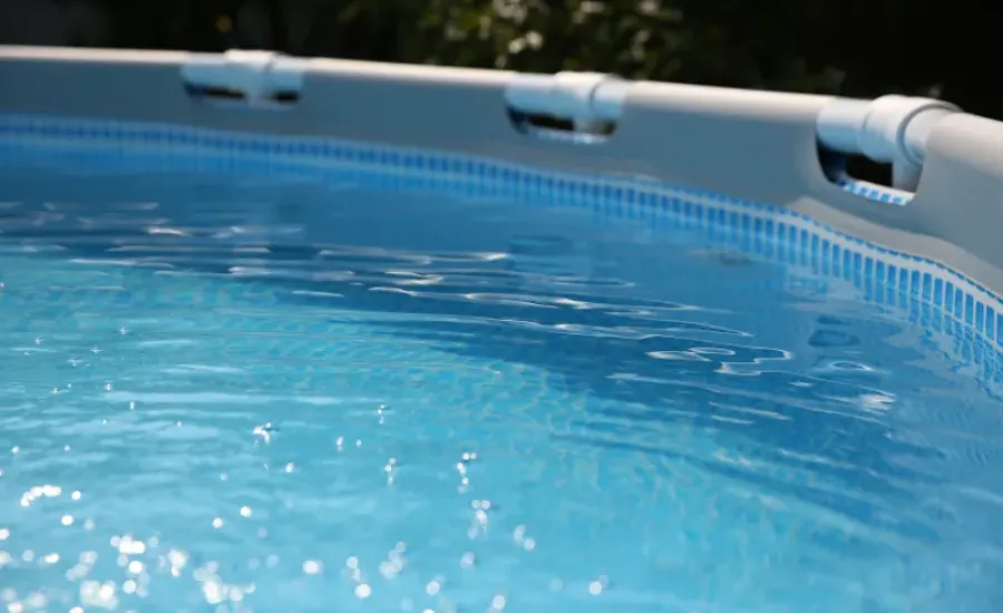 Edge of an above ground pool.